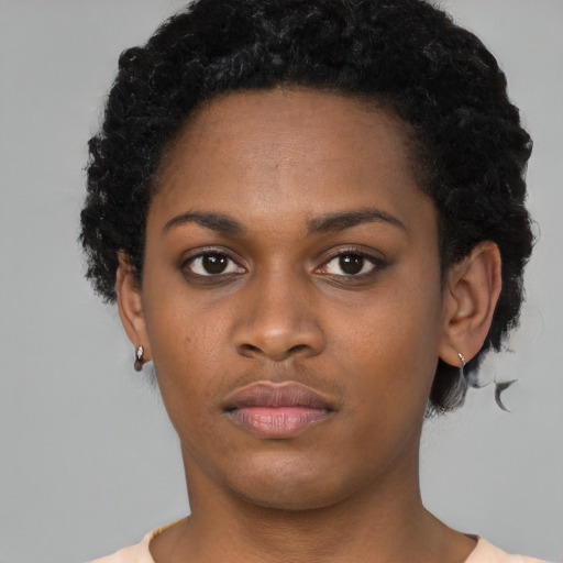 Neutral black young-adult female with short  black hair and brown eyes