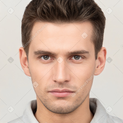 Neutral white young-adult male with short  brown hair and grey eyes