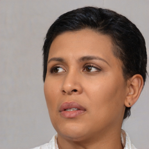 Neutral asian young-adult female with medium  brown hair and brown eyes
