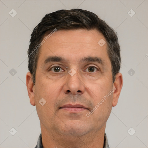 Neutral white adult male with short  black hair and brown eyes