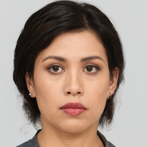 Neutral asian young-adult female with medium  black hair and brown eyes