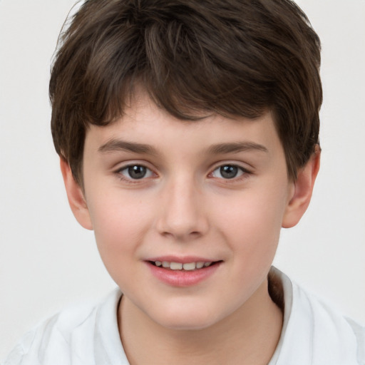 Joyful white child male with short  brown hair and brown eyes