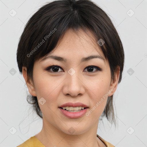 Joyful asian young-adult female with medium  brown hair and brown eyes