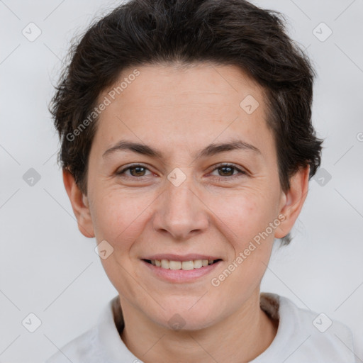 Joyful white adult female with short  brown hair and brown eyes