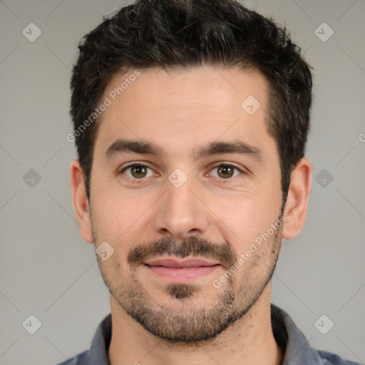 Joyful white young-adult male with short  black hair and brown eyes