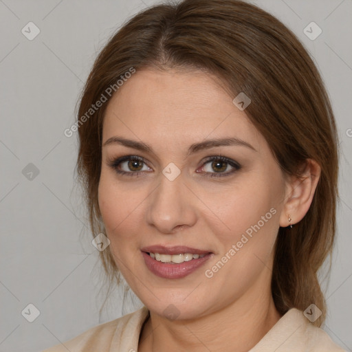 Joyful white adult female with medium  brown hair and brown eyes