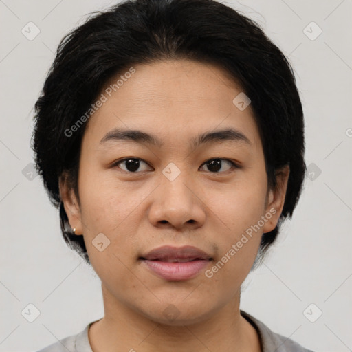 Joyful asian young-adult female with medium  black hair and brown eyes