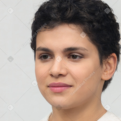 Joyful latino young-adult female with short  brown hair and brown eyes