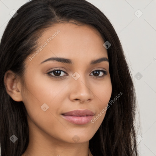 Joyful latino young-adult female with long  brown hair and brown eyes