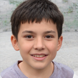 Joyful white child male with short  brown hair and brown eyes