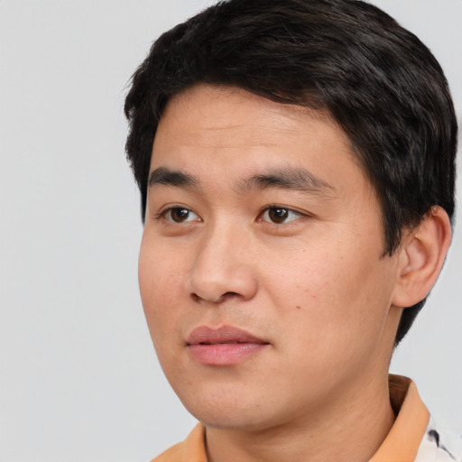 Neutral white young-adult male with short  black hair and brown eyes