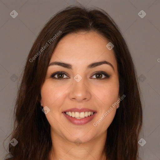 Joyful white young-adult female with long  brown hair and brown eyes