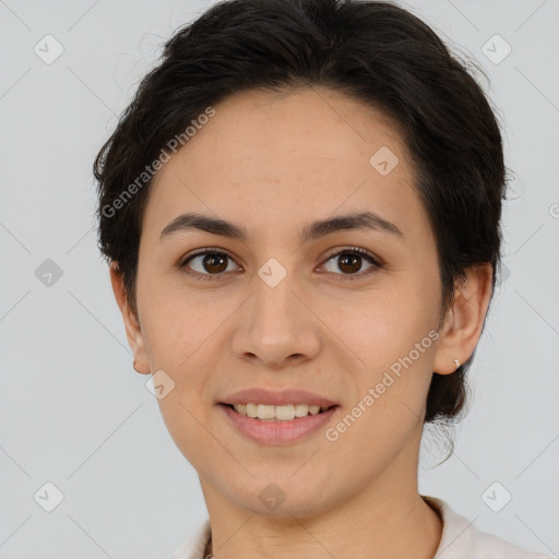 Joyful white young-adult female with short  brown hair and brown eyes