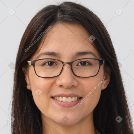 Joyful white young-adult female with long  brown hair and brown eyes