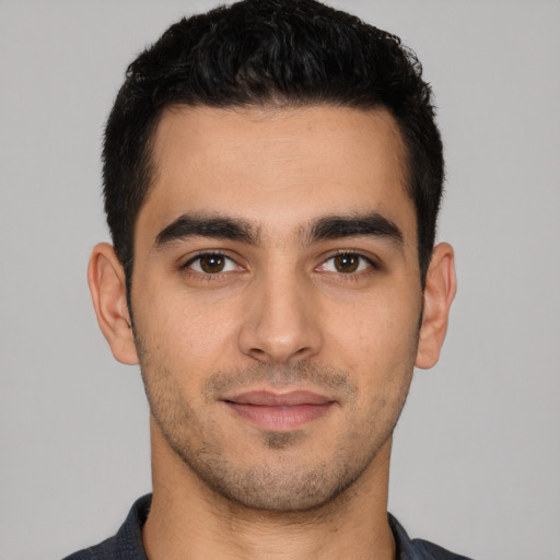 Neutral white young-adult male with short  black hair and brown eyes