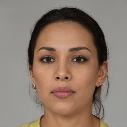 Neutral latino young-adult female with medium  brown hair and brown eyes