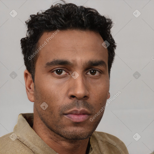Neutral latino young-adult male with short  brown hair and brown eyes