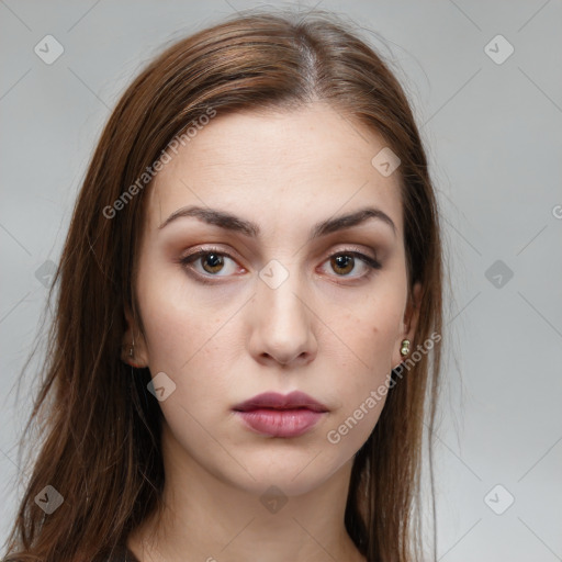 Neutral white young-adult female with long  brown hair and brown eyes