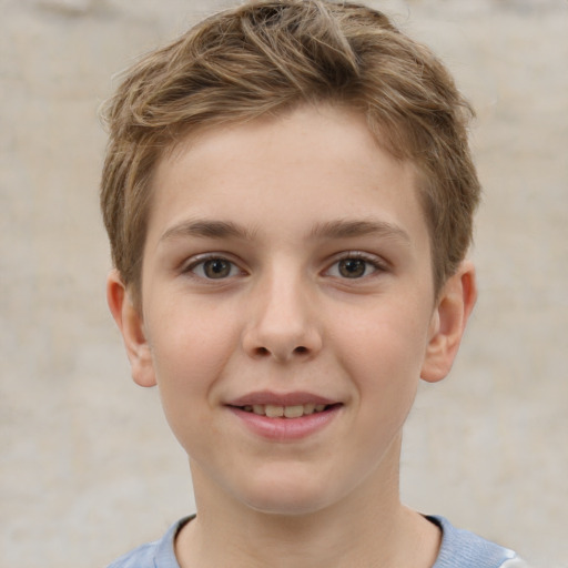 Joyful white child male with short  brown hair and brown eyes