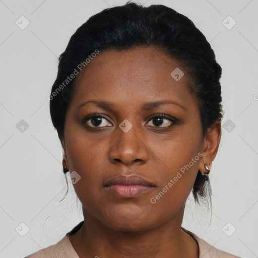 Neutral black young-adult female with short  black hair and brown eyes
