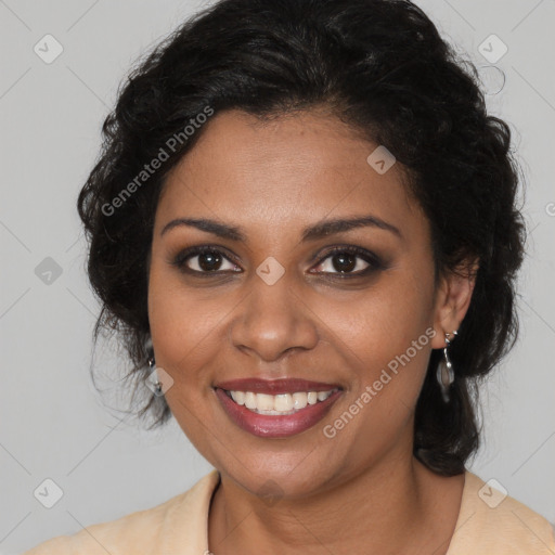 Joyful black young-adult female with long  brown hair and brown eyes