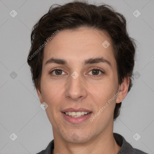 Joyful white adult female with short  brown hair and brown eyes