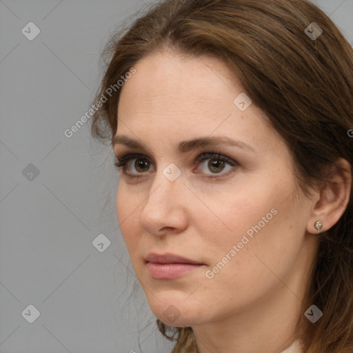 Neutral white young-adult female with long  brown hair and brown eyes