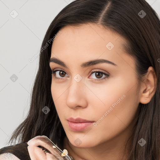 Neutral white young-adult female with long  brown hair and brown eyes