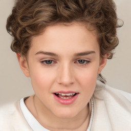 Joyful white child female with short  brown hair and brown eyes