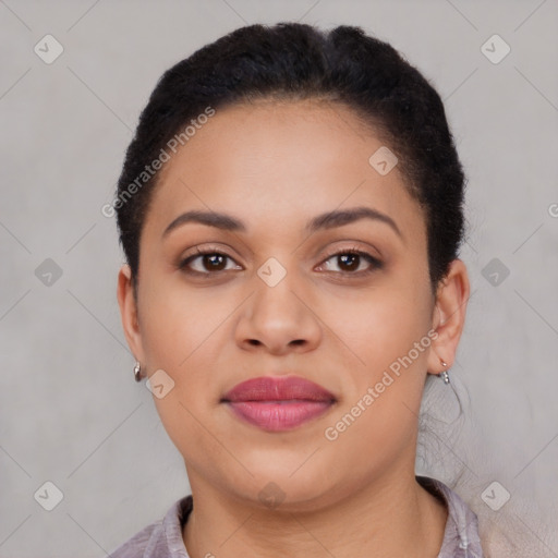 Joyful latino young-adult female with short  brown hair and brown eyes