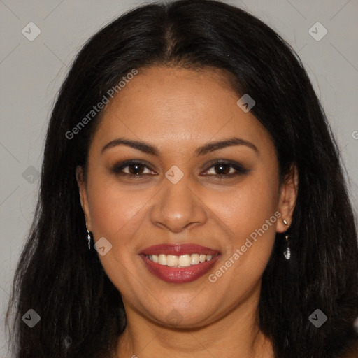 Joyful latino young-adult female with long  brown hair and brown eyes