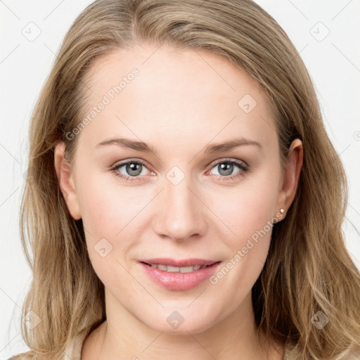 Joyful white young-adult female with long  brown hair and blue eyes