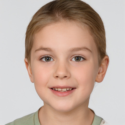 Joyful white child female with short  brown hair and brown eyes