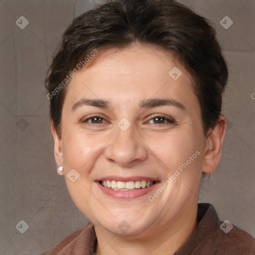 Joyful white adult female with short  brown hair and brown eyes