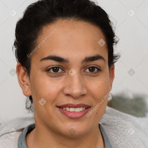 Joyful latino young-adult female with short  brown hair and brown eyes