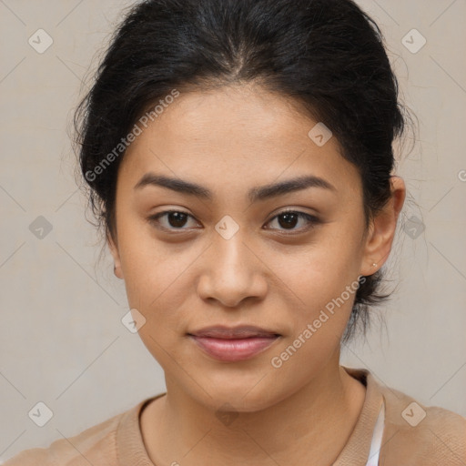 Joyful latino young-adult female with medium  brown hair and brown eyes