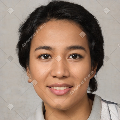 Joyful asian young-adult female with medium  black hair and brown eyes