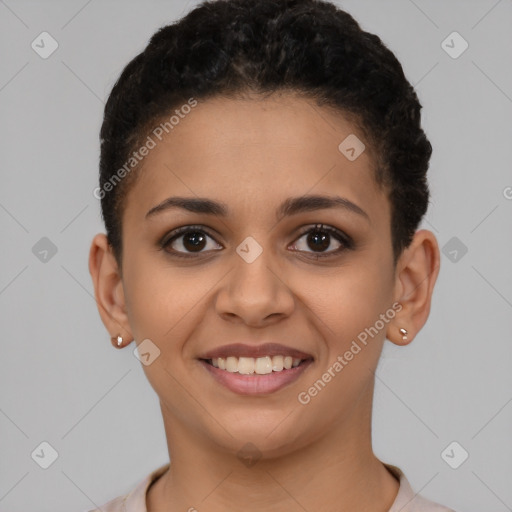 Joyful latino young-adult female with short  brown hair and brown eyes