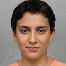 Neutral white young-adult female with short  brown hair and brown eyes