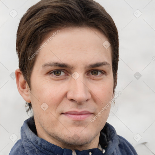 Joyful white adult male with short  brown hair and grey eyes