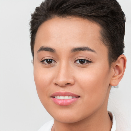 Joyful white young-adult female with short  brown hair and brown eyes