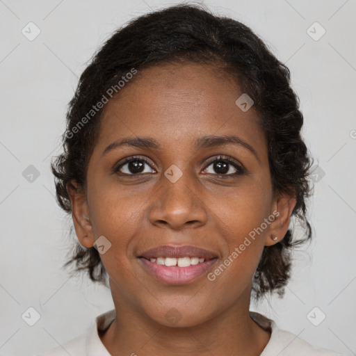 Joyful black young-adult female with medium  brown hair and brown eyes