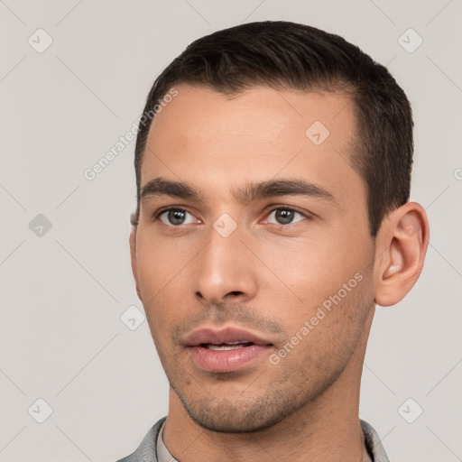 Neutral white young-adult male with short  brown hair and brown eyes