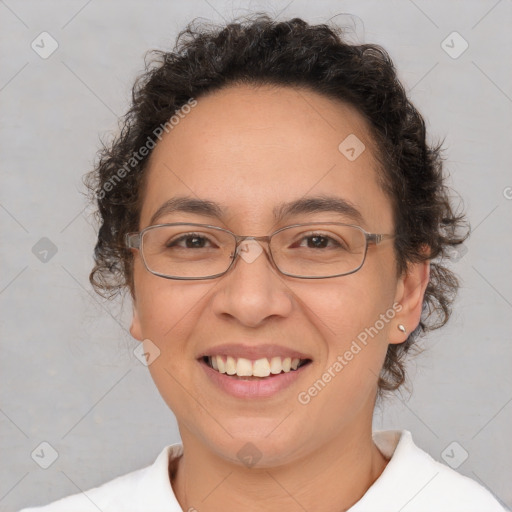 Joyful white adult female with short  brown hair and brown eyes