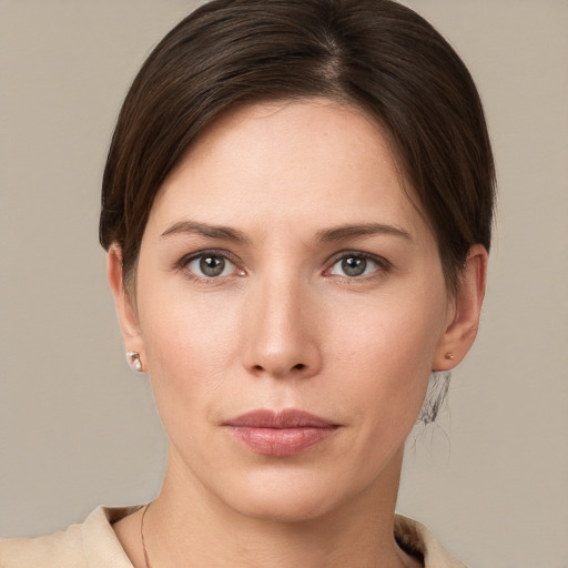 Neutral white young-adult female with short  brown hair and brown eyes