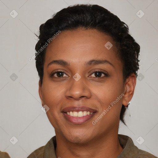 Joyful latino young-adult female with short  brown hair and brown eyes