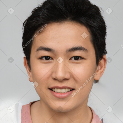 Joyful asian young-adult male with short  black hair and brown eyes