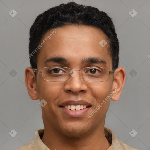 Joyful latino young-adult male with short  brown hair and brown eyes