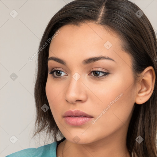 Neutral white young-adult female with long  brown hair and brown eyes