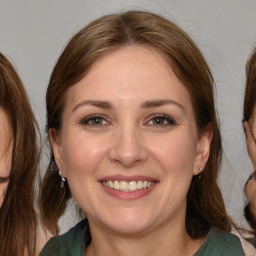 Joyful white young-adult female with medium  brown hair and brown eyes